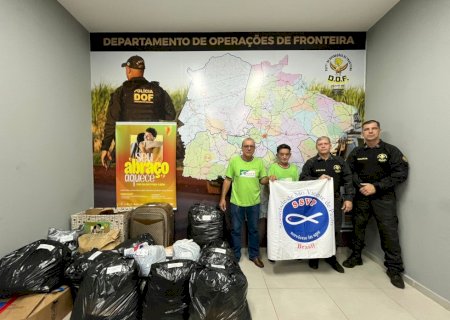 DOF entrega calçados e agasalhos aos Vicentinos para distribuição em Dourados