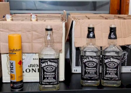 Homem é preso por fabricar whisky falso em casa